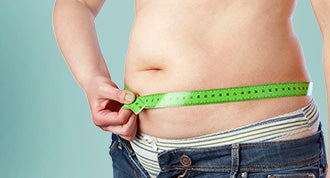 Måling af mave med åbne bukser